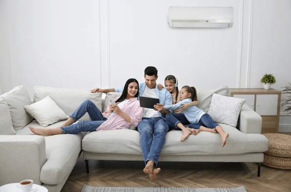 Family relaxing comfortably at home